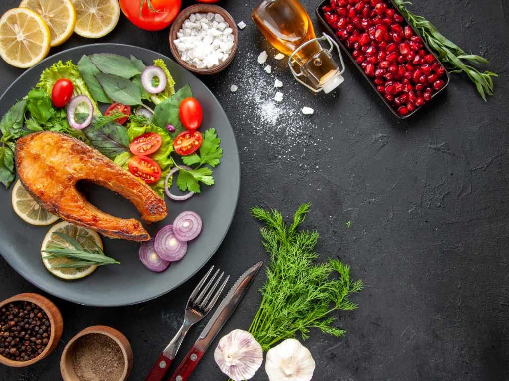 Colorful arrangement of beauty-enhancing foods for women's wellness and beauty