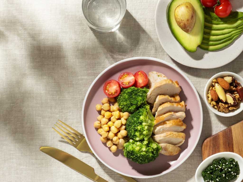 A balanced breakfast plate rich in protein and vegetables representing daily health habits