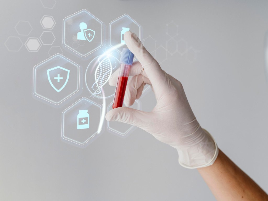 Medical professional holding blood test tube with digital health technology icons representing modern men's health innovation and wellness monitoring