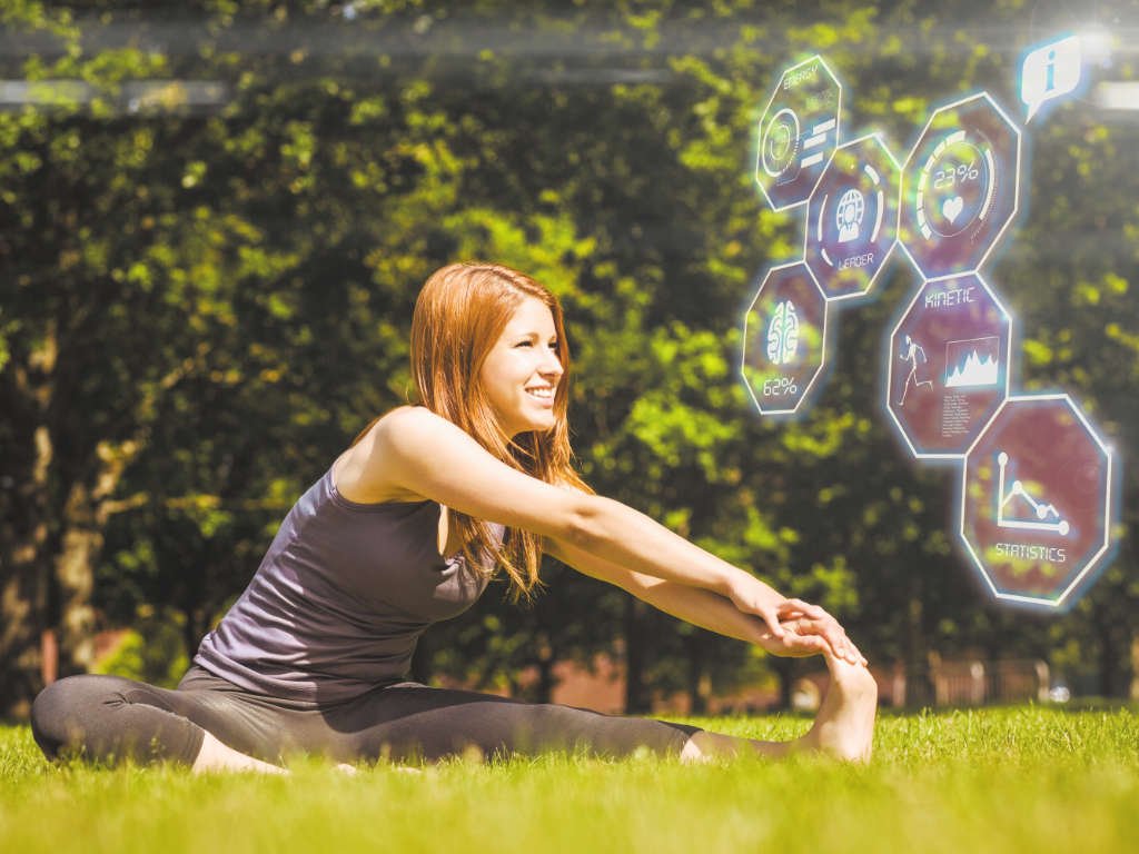 Woman experiencing health benefits of positive eating habits shown with wellness metrics