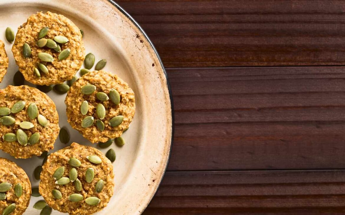 Plant-based protein snacks - homemade energy muffins with pumpkin seeds for muscle recovery and post-workout nutrition