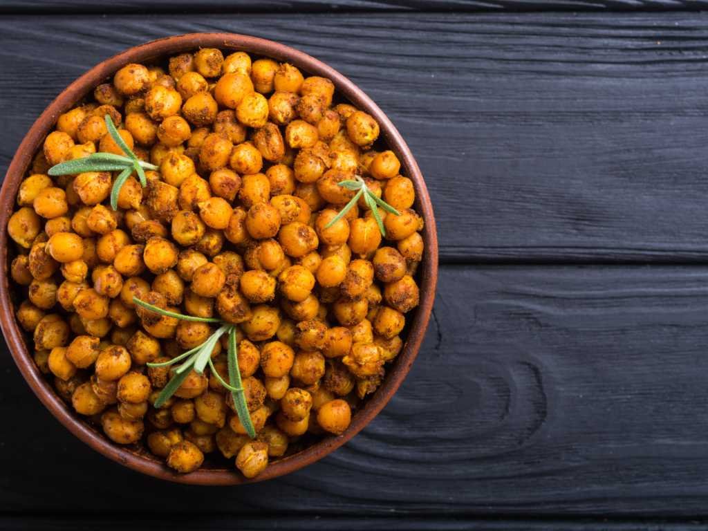 Spiced roasted chickpeas with rosemary - high-protein plant-based protein snacks perfect for energy boost and muscle recovery nutrition